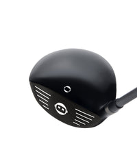 Black golf club head on a white background