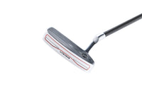 Golf putter with a white and red design on a white background