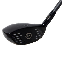 Black golf club head on a white background